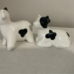 Charming Black and White Cow Figurines